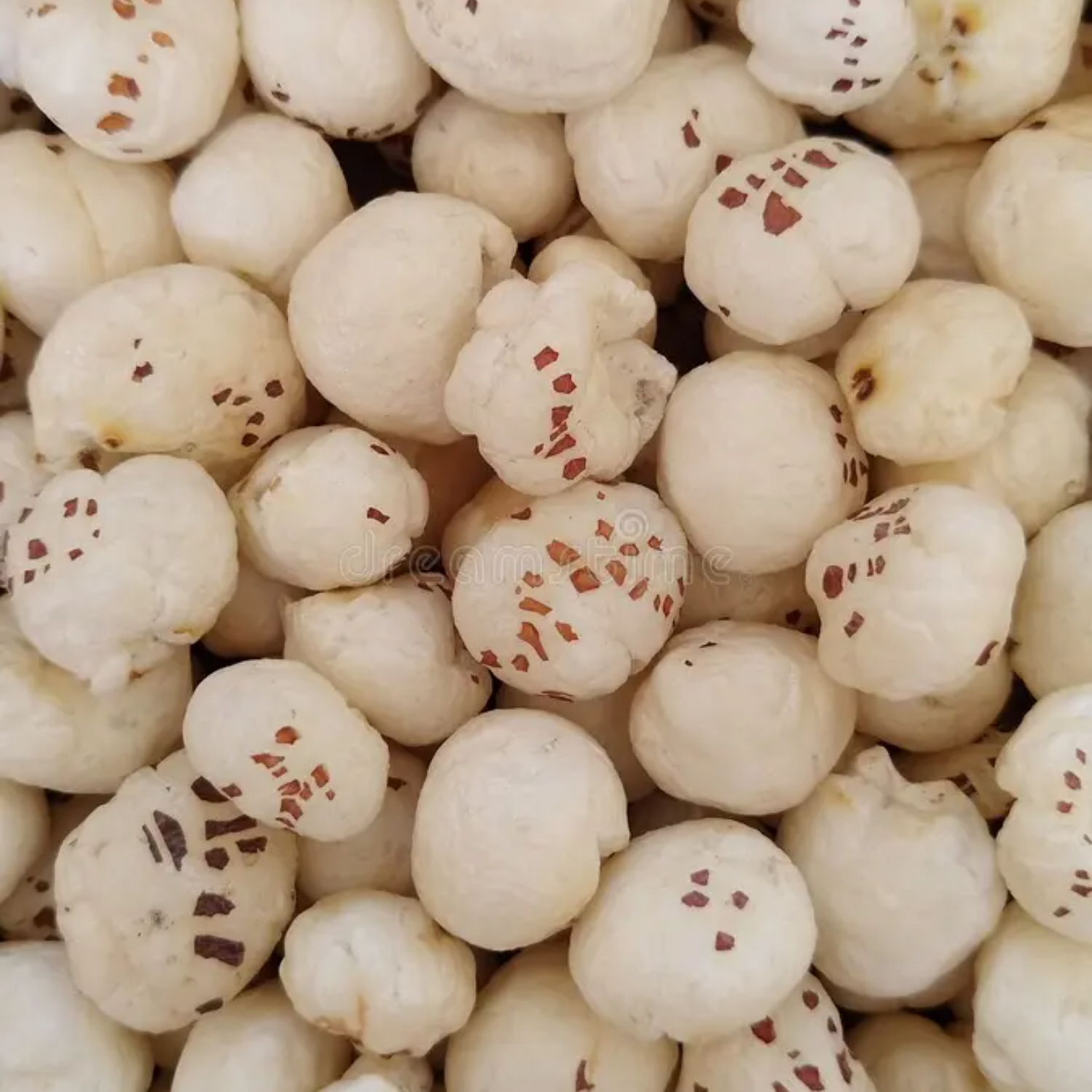 imresizer-fresh-white-popped-makhana-background-indian-traditional-food-ingredient-made-lotus-seeds-194887499 Premium Fox Nuts (Phool Makhana) Export Quality - Image 1